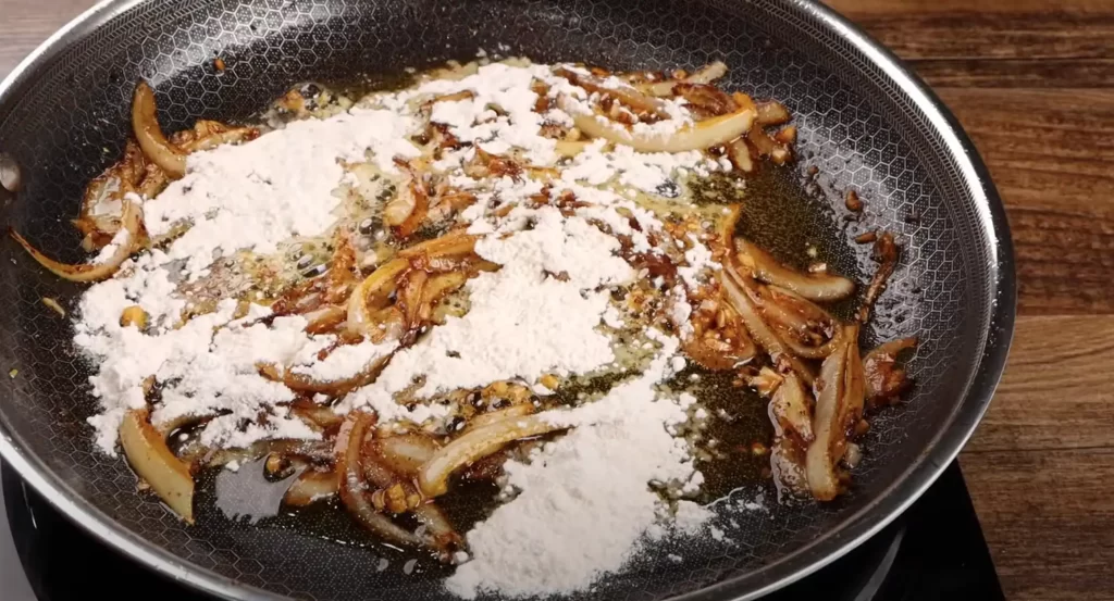 making the gravy for the steak and onions